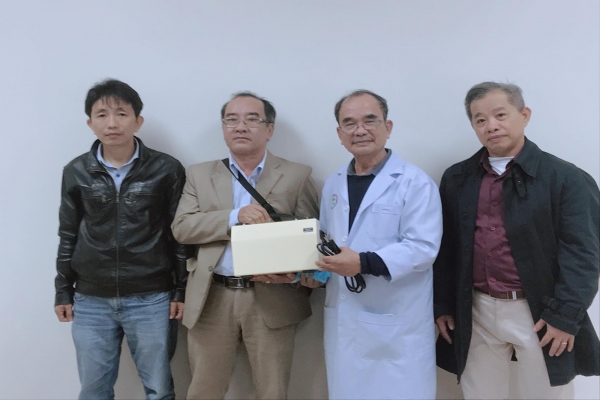 PHAN CHAU TRINH UNIVERSITY SUPPORTING MOUNTING MACHINE TO HIEP DUC DISTRICT MEDICAL CENTER
